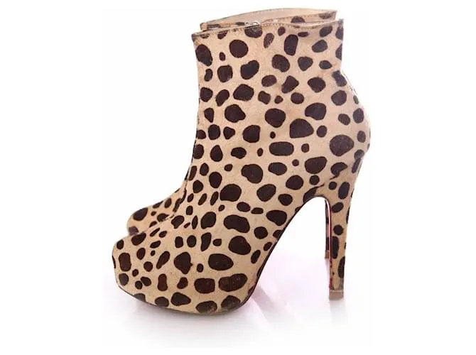 Christian Louboutin, Zapatos de plataforma de piel de potro con estampado de leopardo en talla 39. Castaño 