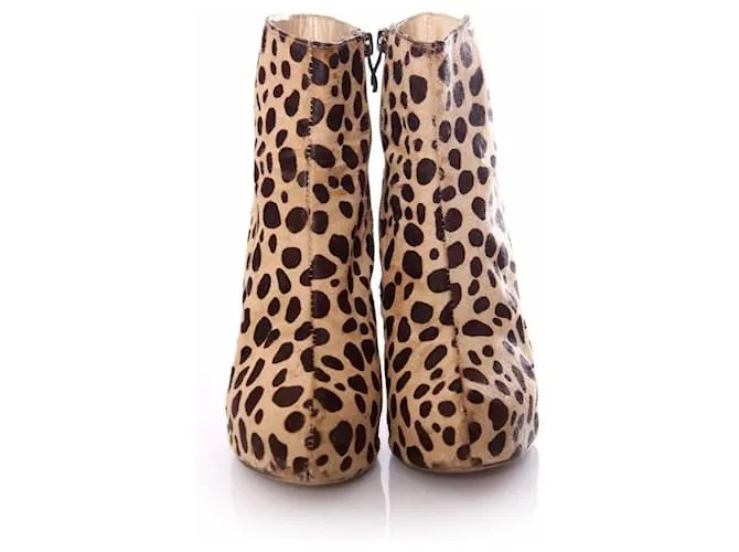 Christian Louboutin, Zapatos de plataforma de piel de potro con estampado de leopardo en talla 39. Castaño 