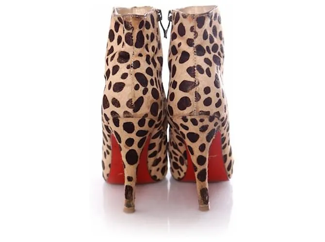 Christian Louboutin, Zapatos de plataforma de piel de potro con estampado de leopardo en talla 39. Castaño 