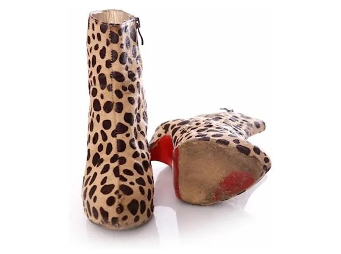Christian Louboutin, Zapatos de plataforma de piel de potro con estampado de leopardo en talla 39. Castaño 