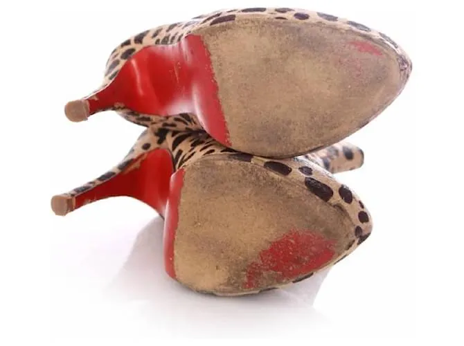 Christian Louboutin, Zapatos de plataforma de piel de potro con estampado de leopardo en talla 39. Castaño 